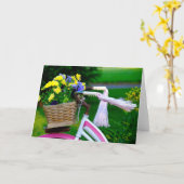 女の子だけのおもしろい、ピンクの女の子の自転車 カード (黄色い花)