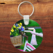 女の子だけのおもしろい、ピンクの女の子の自転車 キーホルダー (正面)