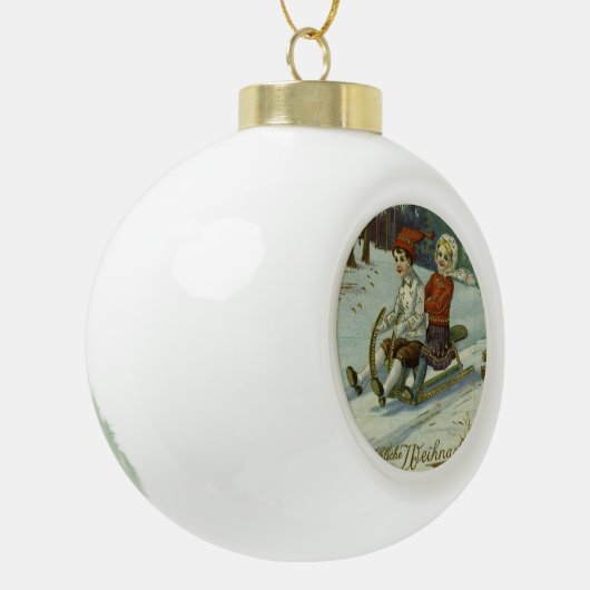 女の子と男の楽しむ子そりに乗るイラストレーション セラミックボールオーナメント (左)
