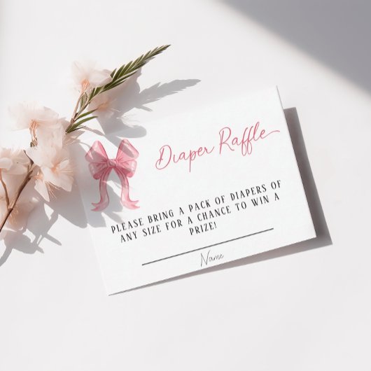 女の子の赤ちゃんシャワーピンクの弓おむつラッフル エンクロージャーカード