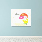 女の子はカメラを持っクリックている キャンバスプリント (インサイチュ (ウッドフロア))