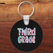 女の子らしいチェックフラワーの3年生の新学期 キーホルダー (正面)