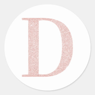 女の子らしい淡いローズゴールドのグリッター モノグラム D ラウンドシール