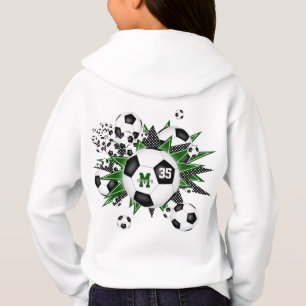 女の子サッカーボールが緑の黒い星を吹き出す