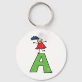 女の子踊りオン緑の文字Aおもしろいアルファベット キーホルダー (正面)