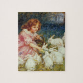 女の食べ物を与え子のウサギ ジグソーパズル (縦)