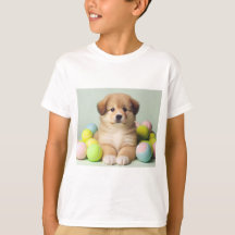 女よくはしゃぐ子と男の子のための子犬のTシャツ。