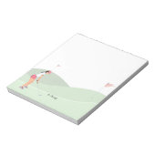 女子ゴルファーがコースでゴルフをしている ノートパッド (回転)