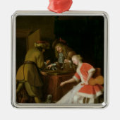 女性および彼女の犬を持つTric-tracプレーヤー メタルオーナメント (正面)