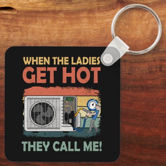 女性がおもしろい熱くなるとHvacを修復する キーホルダー (裏面)