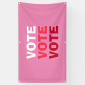 女性がピンクの政治選挙運動を投票 横断幕 (縦)