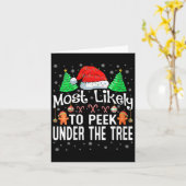 女性が最もクリスマスツリーの下を覗き込む カード (黄色い花)