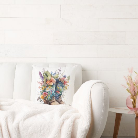 女性のカーボーイのブーツとカラフル花 クッション (ソファ)