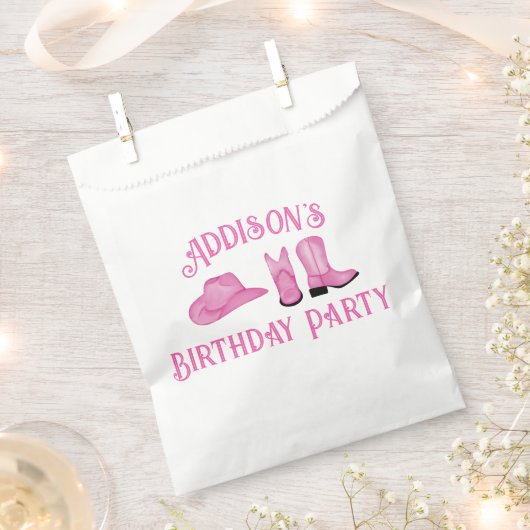 女性のカーボーイハットとブーツ フェイバーバッグ (クリップ留めされた状態)