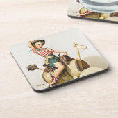 女性のカーボーイライディングピン コースター (左側)