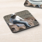 女性のカーボーイ コースター (左側)