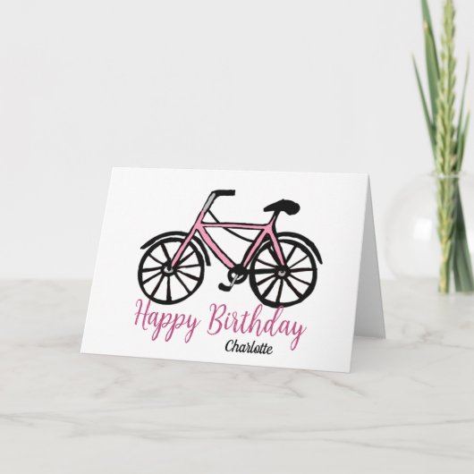 女性のピンクの自転車の誕生日 カード (正面)