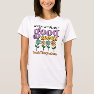 女性のレトロTシャツ、植物の良い種子、花 Tシャツ