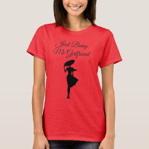 女性の赤のTシャツ Tシャツ