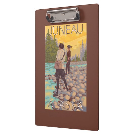 女性は魚釣り-ジュノー、アラスカ--を飛ばします クリップボード (左)