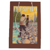 女性はFishingIdahoVintage旅行ポスターを飛ばします ミディアムペーパーバッグ (裏面)