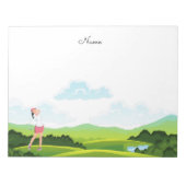 女性ゴルファーはフェアウェイのメモ帳で離陸している ノートパッド (正面)