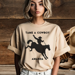 女性用タメ・ア・カウボーイ・マンの馬Tシャツ Tシャツ