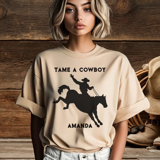 女性用タメ・ア・カウボーイ・マンの馬Tシャツ Tシャツ
