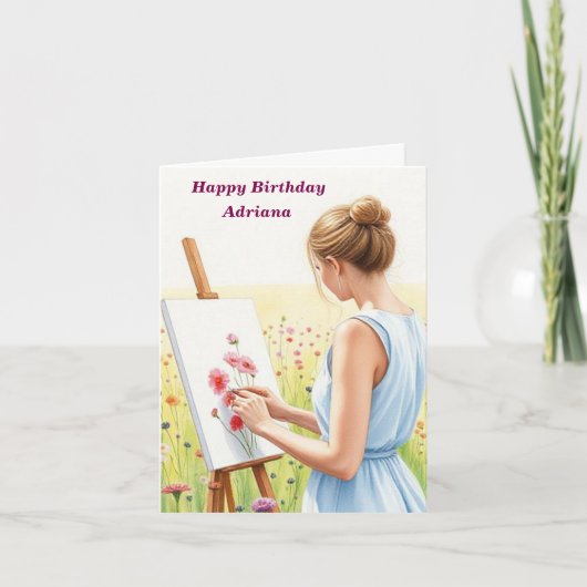女流作家絵を描の花をフィールド誕生日 カード (正面)