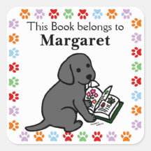 好奇心ブラックラブラドール子犬