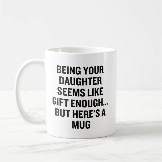 娘だからギフトが足りそうだ コーヒーマグカップ (左)