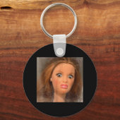 嫌おもしろいな人形顔ミーム キーホルダー (正面)