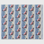 子どもがサンタクロースをビーチに座って見る ラッピングペーパー (フラット)