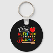 子どもの栄養は私のビジネスにかわいいリンゴに戻る キーホルダー (裏面)