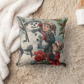 子供たちが雪だるまとセイヨウヒイラギを作っています クッション (ブランケット)