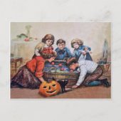 子供たちはハロウィーンでリンゴのためにボブリングしている ポストカード (正面)