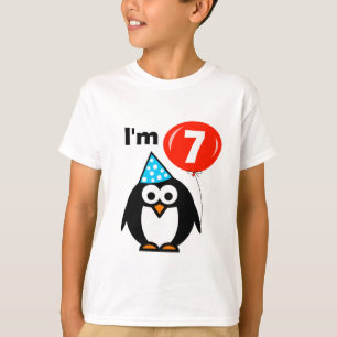 子供のかわいいペンギンの漫画が付いている第7誕生日のワイシャツ Tシャツ