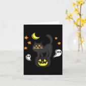 子供のためのカボチャの上の不気味なハロウィンの黒猫 カード (黄色い花)