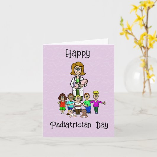 子供用グリーティングカードを持つ女性小児科医 カード (黄色い花)