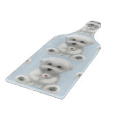 子犬がおもちゃを抱きしめている カッティングボード (角)