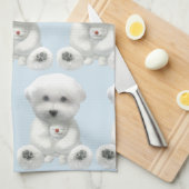 子犬がおもちゃを抱きしめている キッチンタオル (四つ折り)