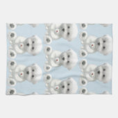 子犬がおもちゃを抱きしめている キッチンタオル (横)