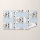 子犬がおもちゃを抱きしめている ハンドタオル (ハンドタオル)