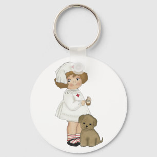 子犬のTシャツおよびギフトを持つヴィンテージのナース キーホルダー