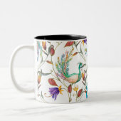 孔雀と花のシームレスなパターン ツートーンマグカップ (左)