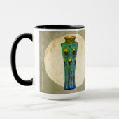 孔雀の羽の最高傑作1900マグカップから マグカップ (左)