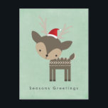 季節のごあいさつRed Santa Hatのクリスマスディアー シーズンポストカード<br><div class="desc">カバのミニマルなフェスティバルが入った可愛いハガキ感じが。赤い魅力的サンタハットを着た茶色のウッドランドの鹿のイラストレーション – ヒップスタースタイル。レトロな緑の背景に設定。このポストカードの背面には、あなたの差出人住所をパーソナライズするためのスペースがあり、あなたが変更またはパーソナライズすることができる休日メッセージを含み、ウィムシーのtouchを追加する趣のあるクリスマスツリー装飾を持っている。</div>