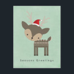 季節のごあいさつRed Santa Hatのクリスマスディアー シーズンポストカード<br><div class="desc">カバのミニマルなフェスティバルが入った可愛いハガキ感じが。赤い魅力的サンタハットを着た茶色のウッドランドの鹿のイラストレーション – ヒップスタースタイル。レトロな緑の背景に設定。このポストカードの背面には、あなたの差出人住所をパーソナライズするためのスペースがあり、あなたが変更またはパーソナライズすることができる休日メッセージを含み、ウィムシーのtouchを追加する趣のあるクリスマスツリー装飾を持っている。</div>