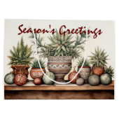 季節の挨拶でクリスマスの汁を吸う ラージペーパーバッグ (裏面)