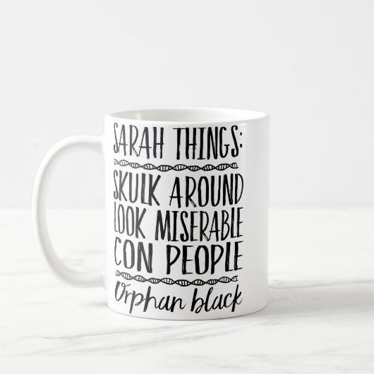 孤児の黒いサラの事のマグ コーヒーマグカップ (左)